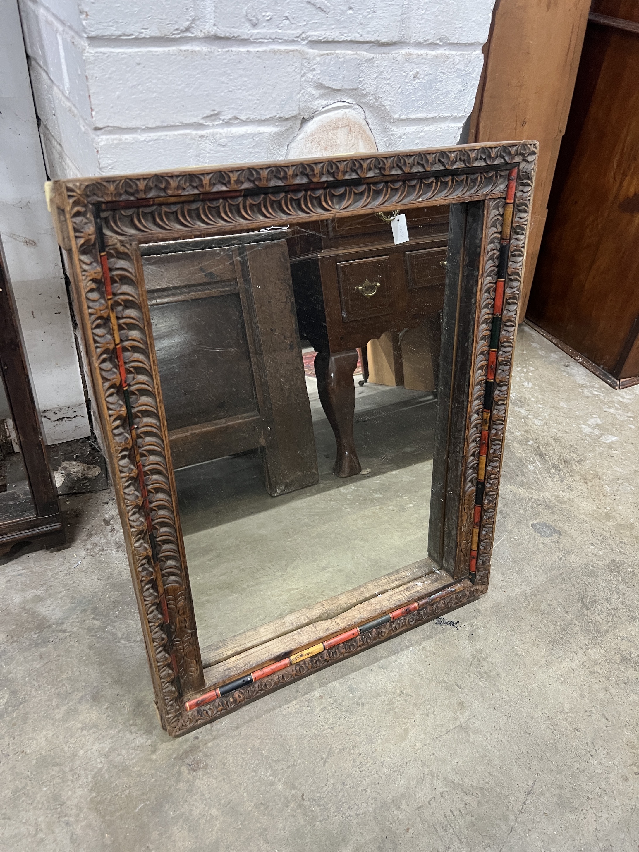 A rectangular giltwood and composition wall mirror, width 59cm, height 74cm together with an Indonesian rectangular hardwood wall mirror